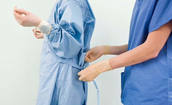 Covid-19: Putting on personal protective equipment (PPE)